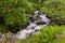 Waterfall on Watendlath Beck, English Lake District, Cumbria, England.