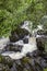 Waterfall on Watendlath Beck, English Lake District, Cumbria, England.