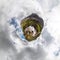 Waterfall water of a mountain lake under a blue sky in the clouds. sand beach. Tiny little planet 360