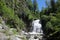 Waterfall At wild coast Teletskoe lake, Altai State Natural Bio