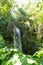 Waterfall in the wild tropical forest. El Nicho, Cienfuegos, Cuba