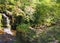 Waterfall in woodland at crimsworth dean near pecket well in calderdale west yorkshire