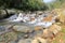 Waterfall of yuanyang xi ( mandarin duck ) creek