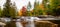 Waterfalls flowing into Lake of the Falls in Mercer, Wisconsin in September