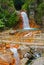 Waterfalls, huge rocks, bridge, Philippines. Valencia, island Negros.