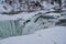 Waterfalls in Letchworth State Park view during winter. USA