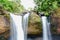 Waterfalls with many green trees in spring in Thailand