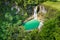 Waterfalls in a mountain gorge in the tropical jungles of the Philippines, Cebu. Aerial view from the drone