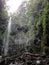 waterfalls, rocks and cliffs full of greenery