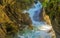 Waterfalls Stanghe Gilfenklamm localed near Racines, Bolzano in South Tyrol, Italy. Wooden bridges and runways lead through the