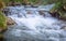 Waterfalls Stanghe Gilfenklamm localed near Racines, Bolzano in South Tyrol, Italy. Wooden bridges and runways lead through the