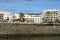 Waterfront Avenida la Marina and a carved pavilion of the tourist information center in Arrecife, Spain