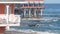 Waterfront beachfront cafe on piles or pillars, Monterey beach, California coast