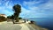 Waterfront in the Croatian city of Opatija and people walking on a sunny winter day