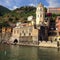 Waterfront historic Italian village scene with church Vernazza Italy