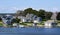 Waterfront houses in Westport Point, MA on a clear summer day