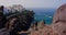 Waterfront of ocean rocky volcanic coast in town Puerto de Santiago, Tenerife. Acantilado de Los Gigantes. Canary