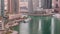 Waterfront promenade in Dubai Marina aerial timelapse. Dubai, United Arab Emirates