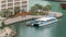 Waterfront promenade in Dubai Marina aerial timelapse. Dubai, United Arab Emirates