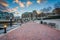 The Waterfront Promenade and waterfront residences at sunset, at the Inner Harbor in Baltimore, Maryland