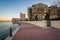 Waterfront residences and the Waterfront Promenade at sunset, at the Inner Harbor in Baltimore, Maryland