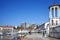 The waterfront seaport with a colonnade and views of the city on a Sunny day. Sochi, Russia