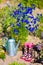 watering can and kids gardening boots in garden