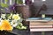 Watering can and old books