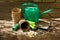 Watering Can, Peat Pots, Fork, Scoop, Hoe, Roll Rope And Flowers