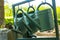 watering cans on a cemetery