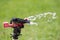 Watering grass sprinkler