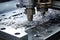 Waterjet Cutting. Machine using water pressure to cut through stainless steel materials