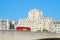 Waterloo Bridge with a passing bus and facade of Shell Mex House in the background