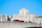 Waterloo Bridge with a passing bus and facade of Shell Mex House in the background