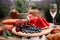 Watermelon with berries and fruits and a glass of rose wine. A summer picnic