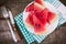 Watermelon cuts with plate on cloth