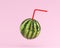 Watermelon, Juice with straw on pink color pastel background. mi