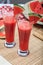 Watermelon juices preparation on a wooden table