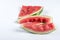 Watermelon leftovers above white background