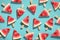 Watermelon pattern. Sliced watermelon on color background.