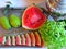 Watermelon, pears, knife on a metal tray