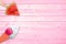 Watermelon popsicle and ice cream cone on pink planks with copy space, summer concept