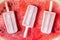 Watermelon popsicles on fresh and natural background.