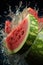 Watermelon ripe with flying splash