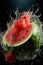 Watermelon ripe with flying splash