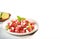 Watermelon Salad with Feta, avocado, mint, lime on white marble background. Delicious, refreshing watermelon salad