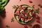 Watermelon salad on light red table. Flat lay, top view