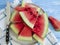 Watermelon slices natural, plate organic yummy freshness sweet summertime on a blue wooden background