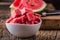 Watermelon. Water melon sliced in bowl on wooden table