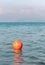 Waterpolo ball floating in the sea waters